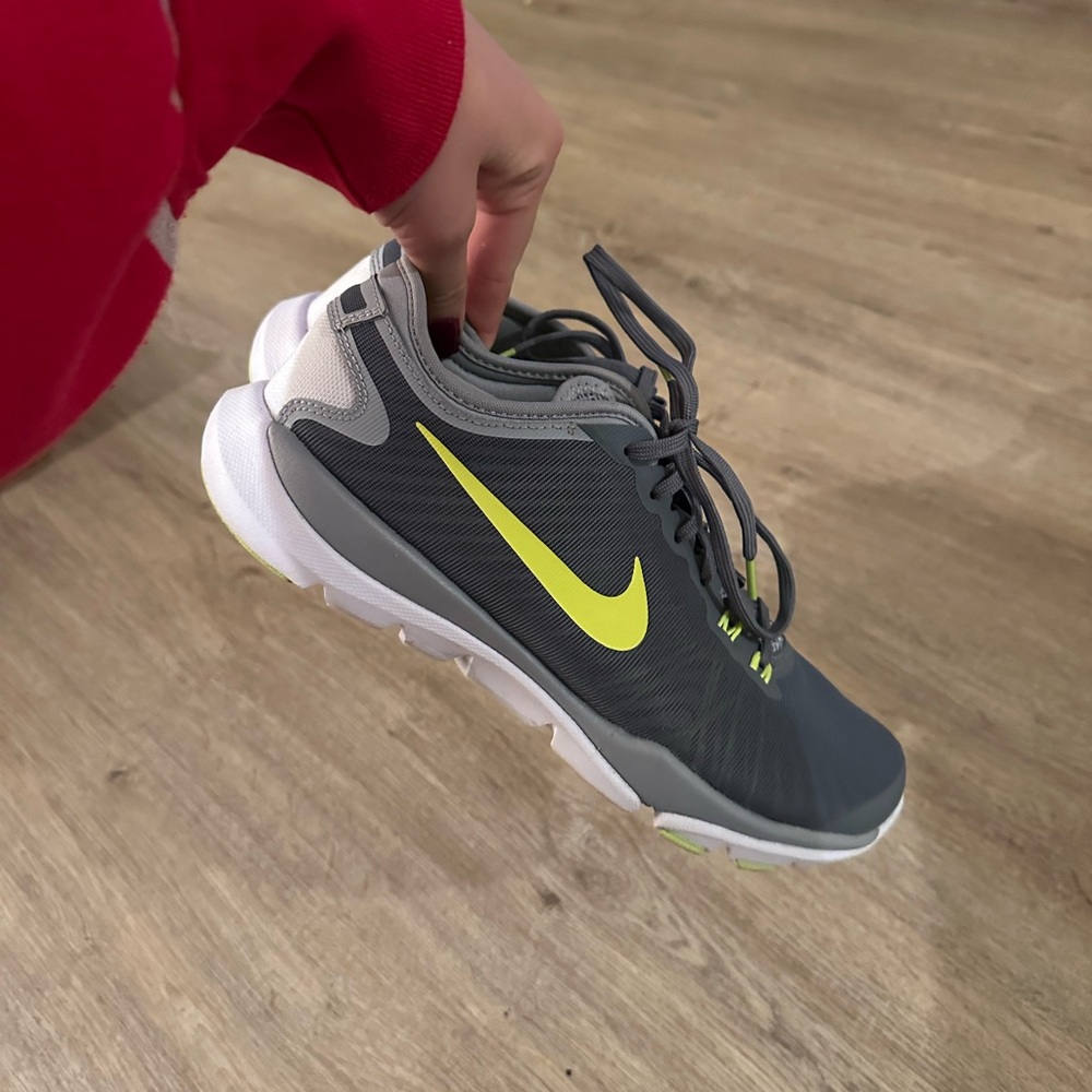 Nike womens Gray Sneakers with Yellow Swoosh